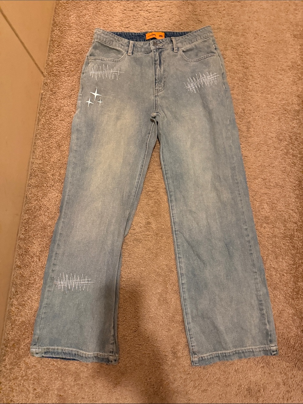 Men's Light Wash Bootcut Jeans with Subtle White Stitch Accents